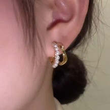 c shape gold earrings