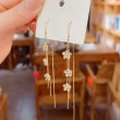 gold flower tassel earrings