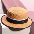  brown straw hat with metal letter